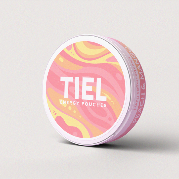 TIEL koffein snus i smaken peach & mango, ståendes på vit bakgrund.